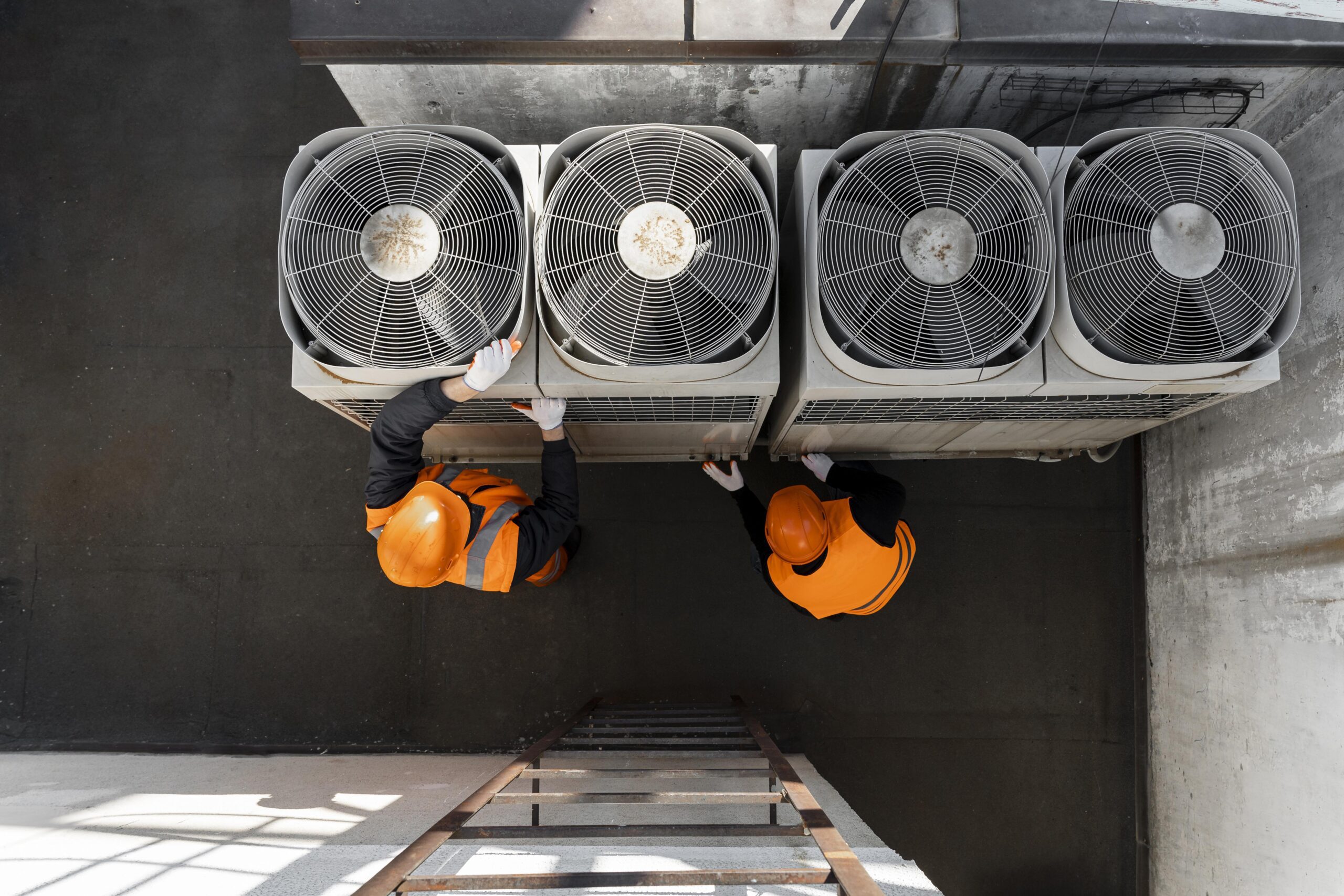 men working on commercial HVAC