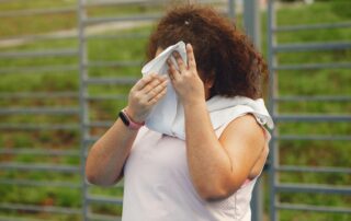 woman outside sweating