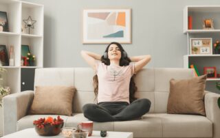 young woman breathing fresh healthy indoor air